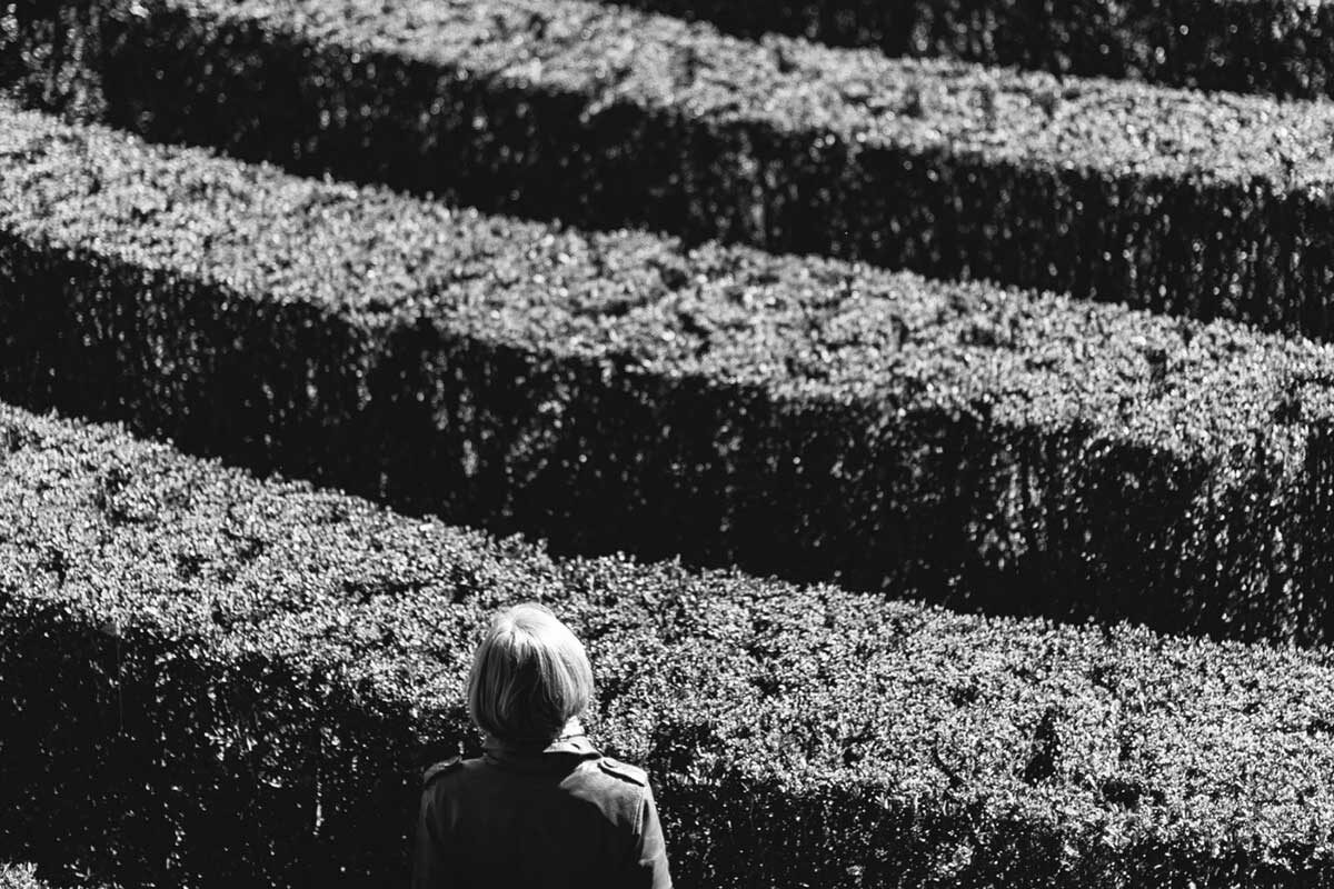 A woman in a maze.